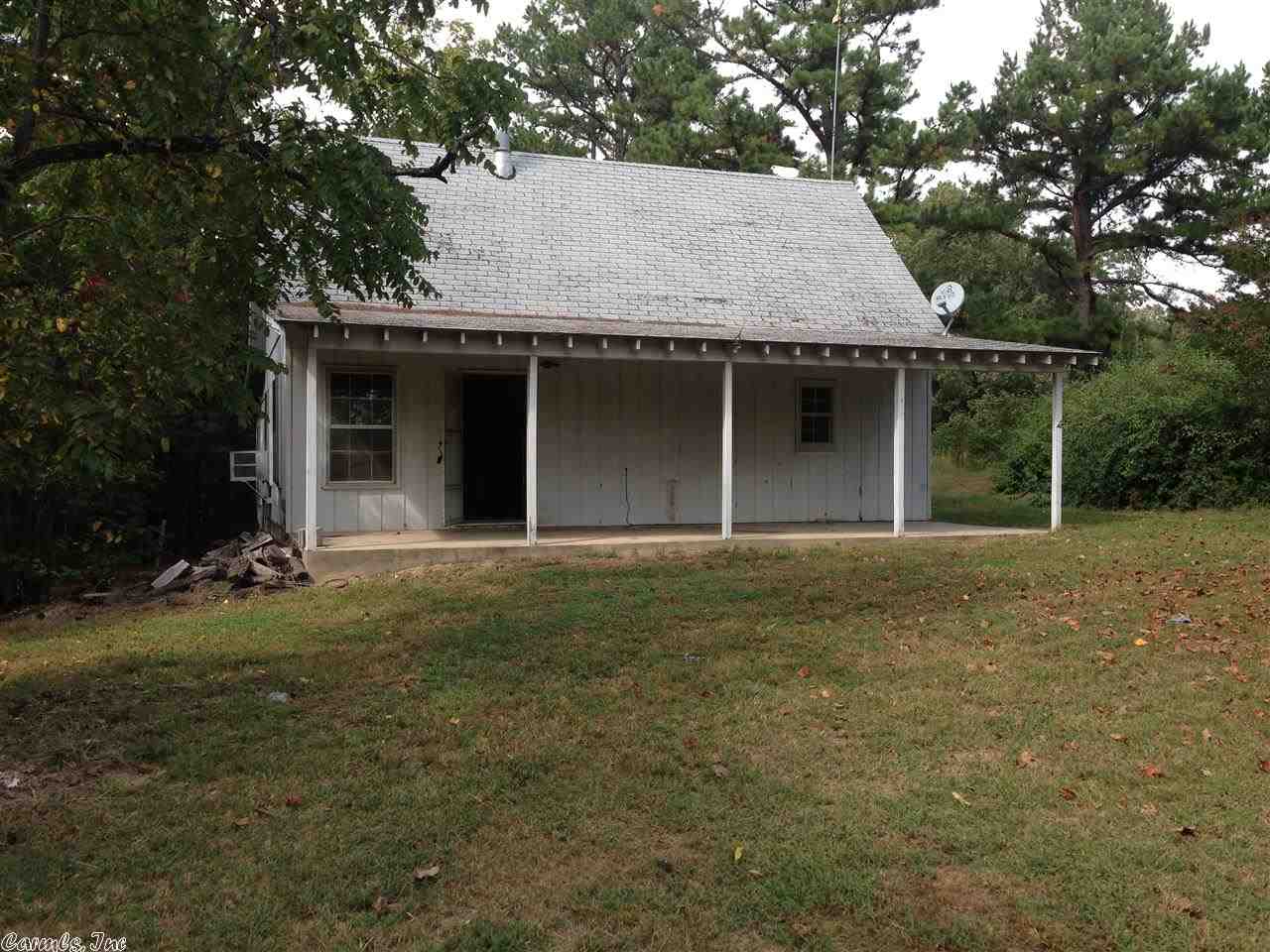 Hunters Haven. Rural cabin has 1 bedroom with 2 other large rooms that can be used as bedrooms and 1 bath. Needs TLC to be the hunter's home away from home! There are other buildings on the property, one has been used as a house that has 2 bedrooms, and a shed and barn. This property is south of Yellville. Property is being sold āas isā.