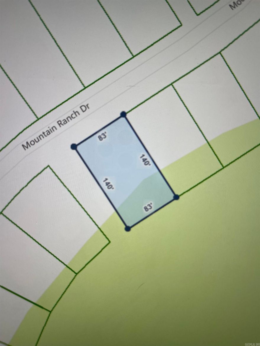 Come build your dream home today on the golf course frontage lot. Enjoy living in Fairfield Bay, where every day feels like a vacation! Nestled amidst the picturesque landscapes of the Mountain Ranch Golf Course, this area offers you the perfect blend of relaxation & adventure.  With this prime location, you can indulge in your passion for golf anytime you desire. Tee off during the day & as the sun sets, bask in the breathtaking views of the shimmering lake nearby. This is the epitome of tranquil living at its finest. But that's not all! Fairfield Bay boasts a plethora of amenities to enrich your life. Within minutes of your new abode, you'll find a full-service marina, beckoning you to embark on aquatic adventures whenever the mood strikes. Dive into the refreshing waters of one of the three swimming pools, or challenge your friends to a game of tennis or pickleball. Feel the thrill of exploration as you traverse the hiking & biking trails, or opt for a leisurely round of miniature golf or disc golf. With over 80 miles of UTV trails at your disposal, the possibilities for outdoor recreation are endless.  Buyer to pay all closing costs and title insurance.