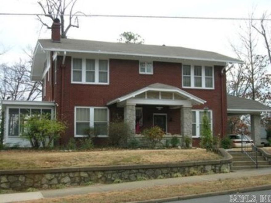 Lovely home in the desirable Historic District with multiple living areas, 4 Bedrooms, updated plumbing and electrical with an enclosed porch and detached garage.