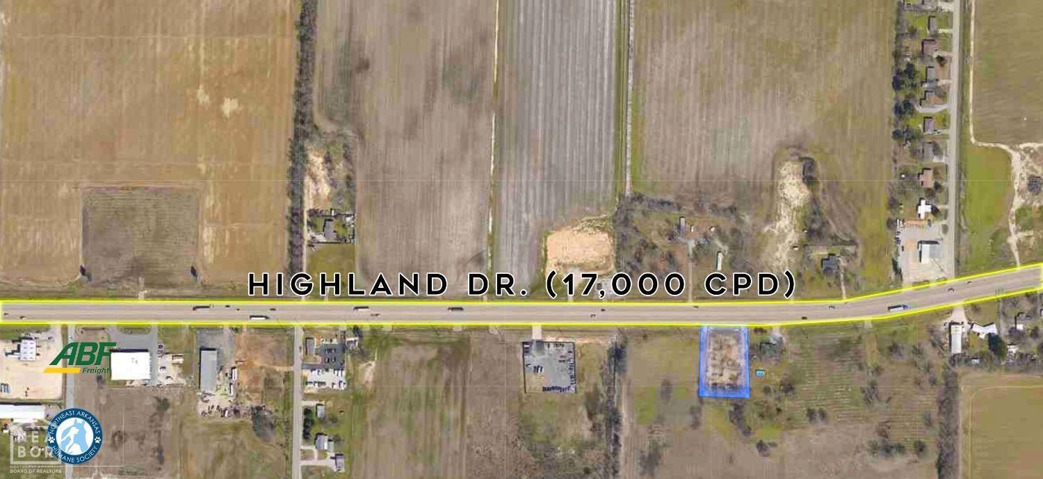 Land available for development and is currently zoned I-1. Highland frontage.