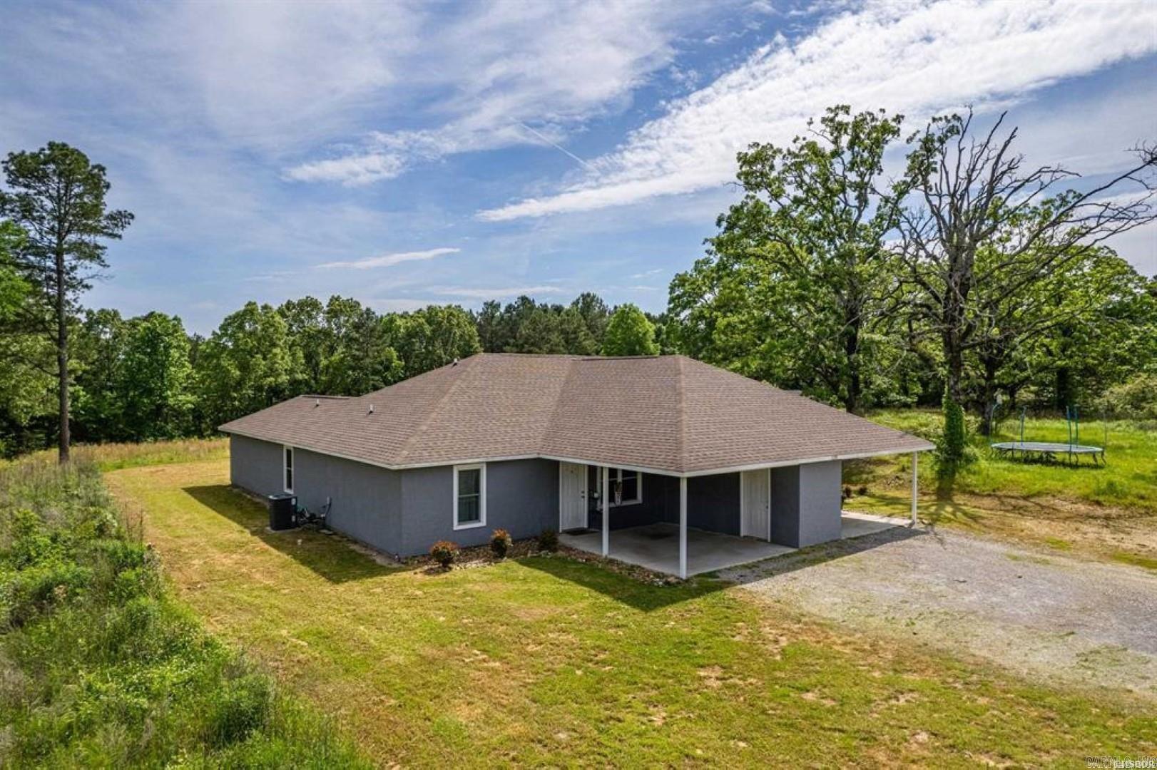 Here is your opportunity to own approximately 9.27 acres in Lake Hamilton School District with 3 acres on Hwy 70W! The property has a leased 3 bedroom, 2 bath duplex with long term tenants. 4 pads ready with water & electricity to build additional duplexes. Just minutes to Lake Hamilton School. Approximately 3 acres on Hwy 70W give this property endless possibilities!