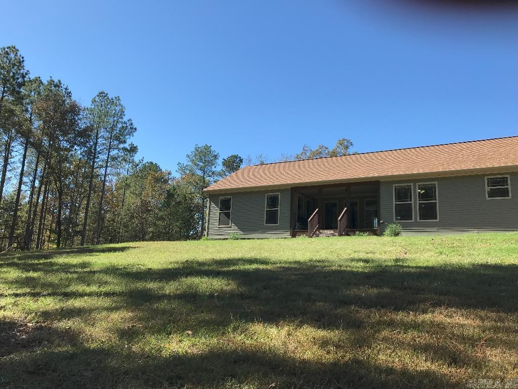 Country living. 11.4+/- acres! Immaculate inside. Manicured w/flowing creeks. Live off beaten path or develop many potential home sites. Workshop shed. Laundry entry, peaceful back porch, established fig, peach, pear & apple trees, well w/softener & filter. Library Ć potential 4th bed. Kitchen island w/power. Cabinets solid wood & soft-close. Quiet. Minutes from Caddo River, Lakes Greeson, De Gray, Ouachita & Hamilton. Near Hot Springs, but far enough out to enjoy peace & quiet. No neighbors adjacent lots.
