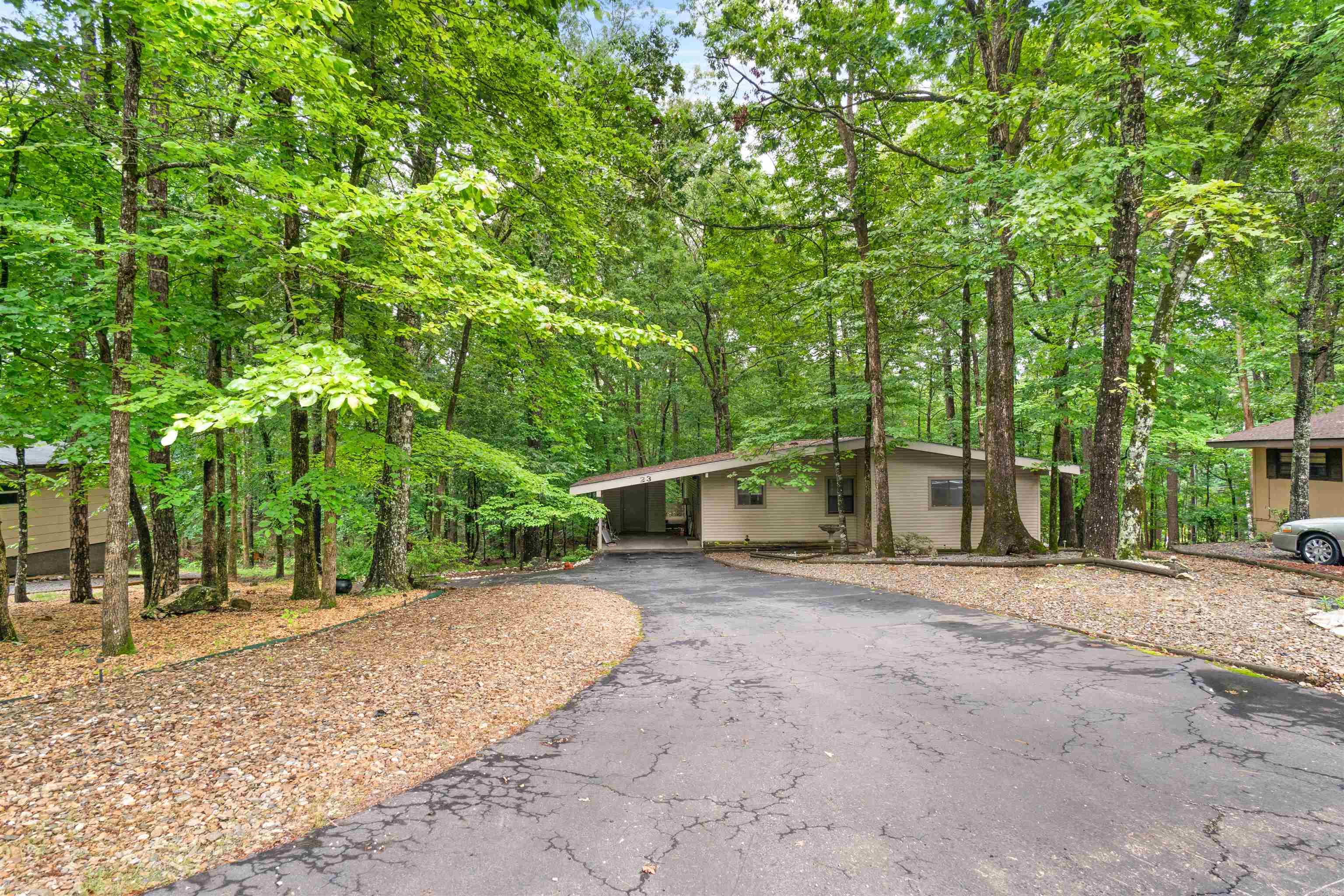 Welcome to this well kept home near the west gate! This 2 bedroom 1.5 bath ranch home features an eat in kitchen with newer tile and dishwasher(2025). ALL the appliances convey. The vaulted ceiling in great room with wood beams open up to sun room(145 sq ft not included in sq footage heated by keeping slider open and cooled by window ac) Main bath has a low profile step in shower. ROOF replaced 2019-2020, FURNACE/AC 2019=2020 . AND lets not forget the low maintenance yard.