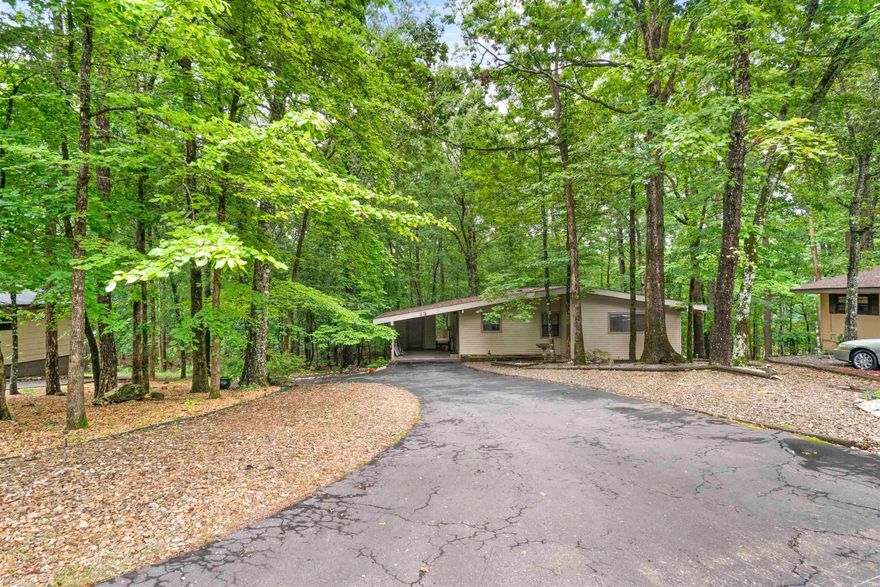 Welcome to this well kept home near the west gate! This 2 bedroom 1.5 bath ranch home features an eat in kitchen with newer tile and dishwasher(2025). ALL the appliances convey.  The vaulted ceiling in great room with wood beams open up to sun room(145 sq ft not included in sq footage heated by keeping slider open and cooled by window ac) Main bath has a low profile step in shower. ROOF replaced 2019-2020, FURNACE/AC 2019=2020 . AND lets not forget the low maintenance yard.