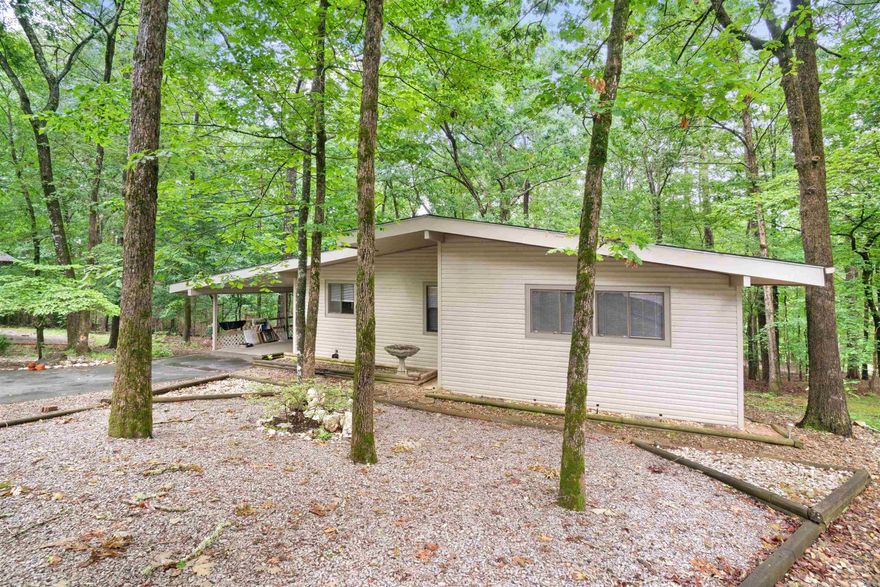 Welcome to this well kept home near the west gate! This 2 bedroom 1.5 bath ranch home features an eat in kitchen with newer tile and dishwasher(2025). ALL the appliances convey.  The vaulted ceiling in great room with wood beams open up to sun room(145 sq ft not included in sq footage heated. Main bath has a low profile step in shower. ROOF replaced 2019-2020, FURNACE/AC 2019=2020 . AND lets not forget the low maintenance yard.