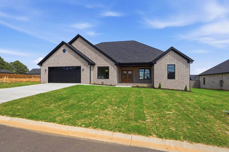 New Construction in Belmont Estates - Searcy, AR! This 4-bedroom, 2.5-bath home offers 2,474 sqft of timeless design with a fresh, modern edge. You’ll love the open split floor plan with LVP flooring throughout, a kitchen featuring a gas range, quartz countertops, and a spacious walk-in pantry — all flowing into a living area centered around a stunning floor-to-ceiling stone electric fireplace. The laundry room includes extra storage space, lockers that passes through to the owner suite side first starting with the closet, then bathroom that features a walk-in tile shower, soaker tub, double sinks, lighted mirrors boasting with natural lighting. Other features of the house include gas heat, gas tankless water heater to add extra efficiency to everyday living. Enjoy quiet evenings or weekend gatherings on the covered back patio with extended concrete pad! Reach out today for details or to schedule a private tour! 2 10 Year special builder warranty.