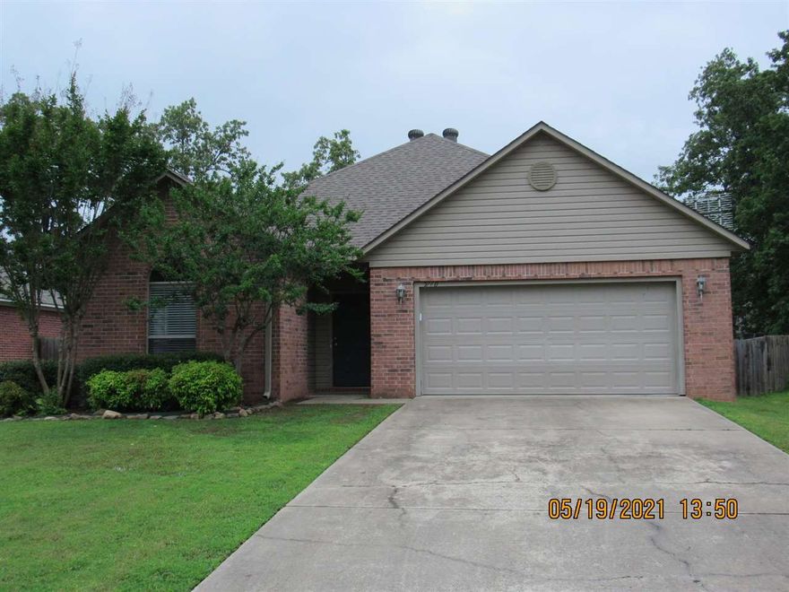 Well maintained 3 bedroom split plan home, tile & laminate floors throughout - no carpet, gas log fireplace in the family room, oversized dining area, large kitchen with new side-by-side refrigerator, 5 burner gas range, large covered deck, detached storage building in the fenced yard, 2 car garage, updated lighting, 2 inch blinds throughout - a must see! No Pets Allowed.