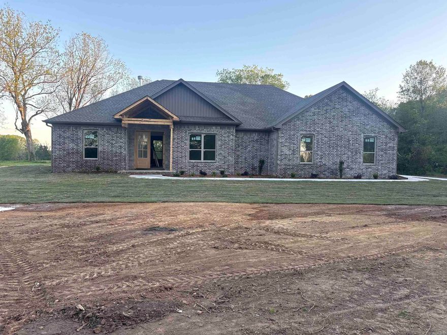 Welcome home to this 4 Bedroom / 2 Bathroom NEW CONSTRUCTION on 1.36 acres in the Cabot School District. Outside of city limits with NO restrictions with land, this is a rare to find home! More than enough room for a pool, shop, barn, and space for boats and toys. Buyers have time to select major interior finishes. The home boasts 2300 sqft of a open and split floor plan, high end finishes, tall ceilings, spacious closets and bedrooms, and a large primary bedroom and bathroom. Stone accents on the exterior, brick accent fireplace, Side loaded garage. Estimated completion May 1, 2025 or sooner.**Completed photos are of the finished floor plan for reference only, colors and finishes will be different, pending buyer selection**.