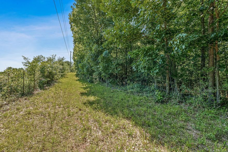 Build the estate of your dreams on what is arguably the most beautiful lane and meadow remaining with South Culberhouse frontage. The beautiful, wooded lane offers privacy as it leads back off the road to a dreamy, cleared meadow with room for 2 or 3 structures. It's located in Valley View School District with just a short drive to campus! Interior Designer Edith Snell created renderings of how the property might be laid out for future use. The 4.9 acre lot presents an exceptional opportunity to build your home of a lifetime.