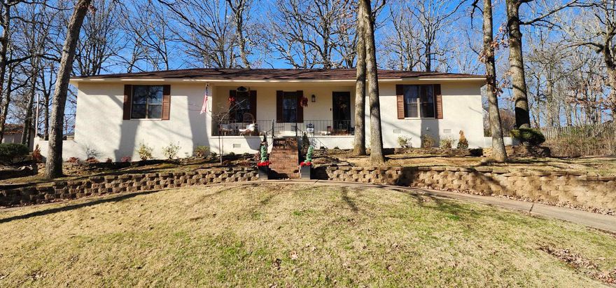 Back on the market through no fault of the home...AT A LOWER PRICEPOINT  Inside this home you will find 4 bedrooms for the entire family to have their own space.  There is also 2 living areas featured in the home.  The 2nd with beautiful built in bookshelves and exposed wood beams.  One of the best features of the home is the additional sunroom that can be used as a 3rd living room, expanded laundry, man-cave, game room, or whatever you can imagine. There is no shortage of things to like about this home. The kitchen features plenty of cabinet space along with a breakfast bar. Step outside and you will find a multi-tiered yard large enough for entertaining. The unique layout of the property is also something to be admired. Come take a look at this beautiful home in one of the most desirable neighborhoods in Wynne.
