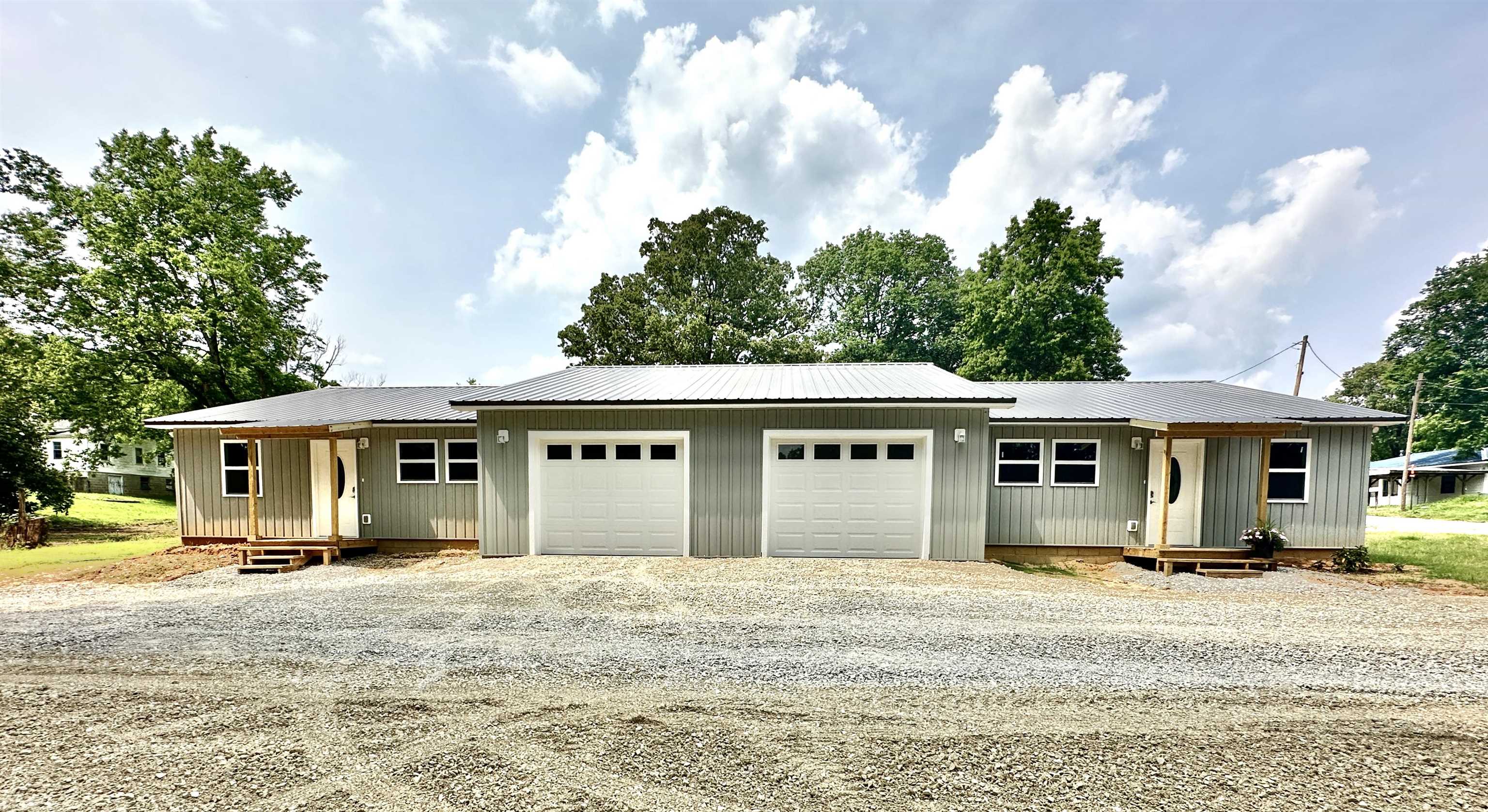 Opportunity is knocking with this new construction, high quality home! Unit A is the road side property and offers 2 bedrooms and bathrooms, 1 flex room that could be used as an office, bedroom, storage, etc. and a strong metal roof that will give peace of mind for years to come! All new appliances will convey as well! Other features include a dedicated laundry room, garage, and an open concept kitchen/living area. You will be hard-pressed to find another brand new home at this price point! Call today to set up your private tour! ***Seller is willing to sell entire duplex together***