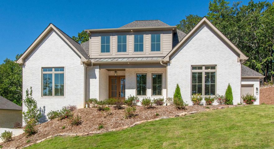 Situated on .31 acre landscaped lot w/greenbelt on right side & rear. Main Level: 6.5x15 10’ Trey ceiling foyer w/half bath. 12x14 Front BR has crank out glass header windows & connecting bath to 11.5x14 BR number 2 w/walk-in closet. 21x21 Great Rm – Elec FP w/remote, bookcases & open to island kitchen w/custom shaker cabinets & separate cabinet area w/wine/beverage refrig. 12x13 Dining area leads to 12x14.5 cov patio & woodburning FP. 15x19 Primary Suite has 4.5x11 sitting area. Custom bath w/2 separate vanity-sink areas, large 2 sided walk-in shower & soaker tub leads to large closet w/built-ins & access to hallway to laundry. Upstairs: Private staircase to 24x26 4th BR or game rm w/separate full bath, walk-in closet & attic storage. Extras: 24x26 double side-entry garage w/5.5x15 workshop area. 10.5x20 single garage has storage rm leading to backyard. 8’ interior doors & 10’ ceilings throughout first floor.