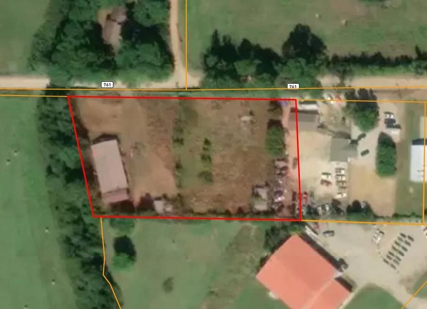 former auto shop with 4 bay doors, metal roof and concrete block building for sale, fenced property, approx 1.65 acres of land across from home for sale, as is sale, estate sale and will be doing an auction of contents