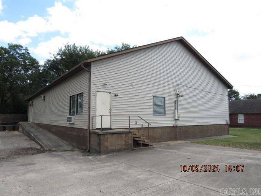 Easy access to Interstate 40! This commercial property is located on a corner lot with a loading dock and overhead door for easy loading and unloading. Interior office consists 2 offices and 1/2 bath with all new LVP flooring and freshly painted interior. The warehouse space consists of approximately 4,000 square feet. The property is zoned C-3.
