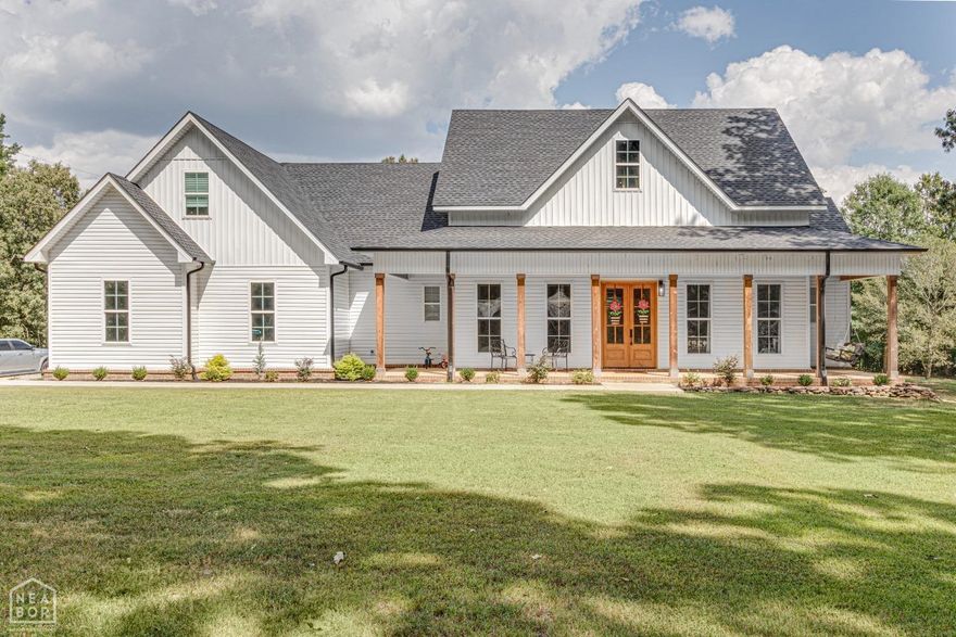 Dreaming of your own getaway right outside of town? Check this one out! Situated on 8.63 +/- acres in the Valley View School District, this home was built in 2021. Adorned with porches and wooden columns, this home will instantly feel like a retreat. Most of the living space in on the lower level. Enter the double front doors into the open living room, dining room and kitchen. The living room holds a gorgeous floor-to-ceiling brick fireplace and vaulted ceilings. An abundance of cabinets, walk-in pantry, island, granite countertops, backsplash, stainless steel appliances and gas stove complete this modern kitchen. Enjoy the split floor plan with two spare bedrooms adjoined with a Jack & Jill bathroom complete with a tiled tub surround & quartz countertops. Spare bedrooms have tall ceilings and walk-in closets. On the other side of the home is an oversized laundry room, half bath and the primary suite. This bathroom will make you want to stay forever! Soaker tub, tiled shower, quartz countertops & a massive walk-in closet finish the suite. This home also has a large fourth bedr