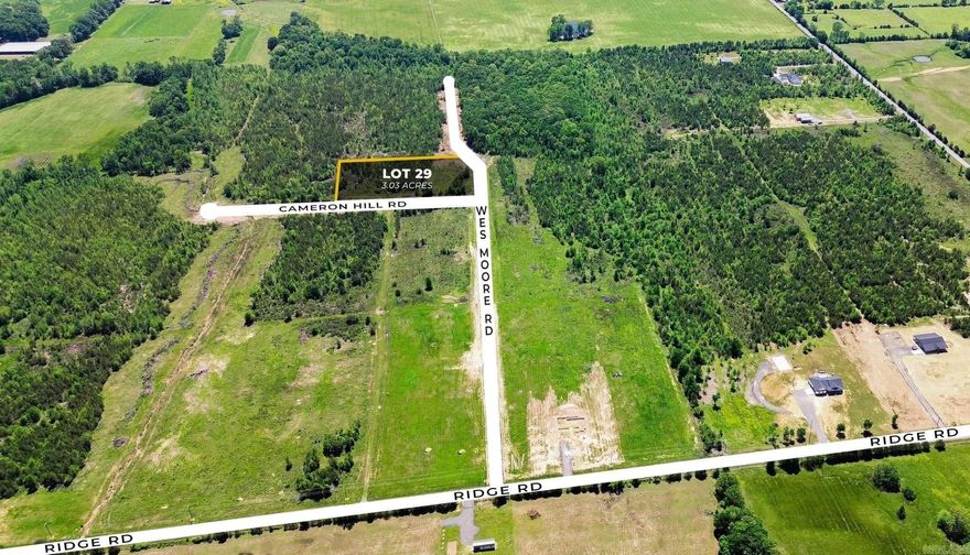 Beautiful flat 3.03+/- acre lot right outside of city limits, perfect spot if you are looking to build! Enjoy great views of the countryside in a quiet area while only being a few minutes from the interstate. 20 mins to Vilonia, 20 mins to Searcy, & 20 mins to Cabot. Water is at the road and electric is at Ridge road. No mobile homes. Minimum square footage of 1800.