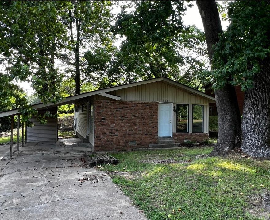 Back on the Market ! This home is a 3 Bedroom 1 1/2 Bath home with approximately 1080 Sq Ft.  The interior has new paint, flooring, new remodel on the main bath and a new HVAC . This home does need some exterior repairs and is being sold as is.