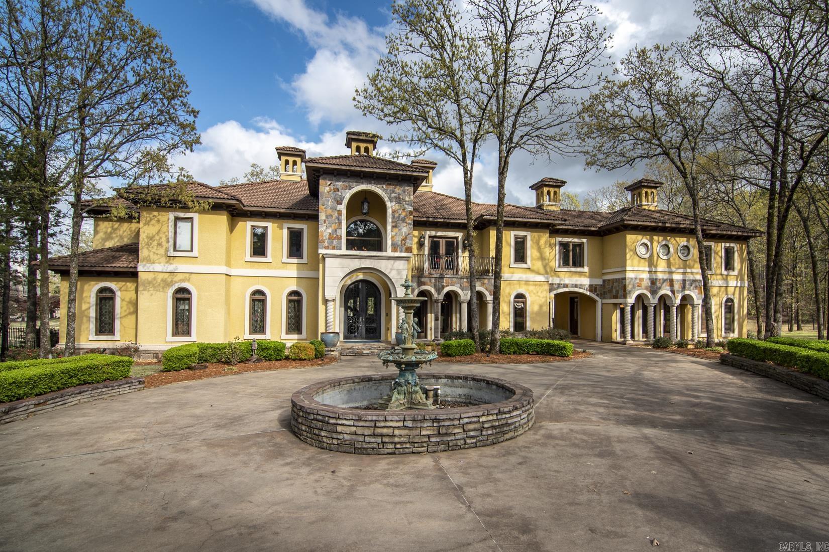 Nestled within the exclusive gated community of Valley Falls, this residence stands as one of the most spectacular homes in West Little Rock. This majestic European-style villa embodyies sophistication using refined materials and an unwavering commitment to detail. Boasting an expansive 8,833 (heated & cooled) square feet of living space, this residence is a haven of luxury and comfort. The grandeur is evident in every corner, from soaring high ceilings that exude a sense of spaciousness to meticulously designed large, formal gathering areas ideal for hosting grand events. Simultaneously, intimate spaces provide a cozy retreat within the lavish expanse of this estate. The outdoor sanctuary is an epitome of leisure and relaxation, featuring a beautifully landscaped backyard that unfolds as an oasis. A spacious pool invites refreshing dips, while the two covered porches and outdoor kitchen sets the stage for delightful gatherings and al fresco entertainment. Additional features include a four-car garage with a motor court.This residence transcends the ordinary, offering an unparalleled lifestyle within the coveted confines of Valley Falls. Additional lot next door sold separately.