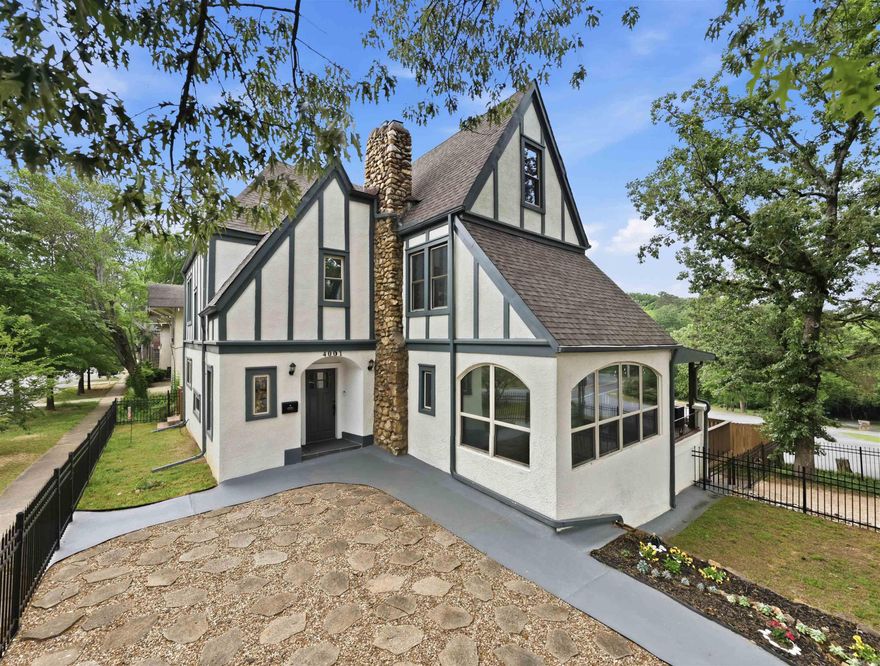 Step into the timeless charm of Hillcrest, where this beautifully restored 1920s home blends historic character with modern luxury. Completely remodeled in 2022, the home offers inviting living and entertaining spaces with a flexible floor plan designed for everyday living. Historic architectural details, including site-finished hardwood floors & restored woodwork, paired beautifully with extensive updates throughout, including premium handcrafted plaster walls & Benjamin Moore washable paint. The main level features a gracious living room w/ stone fireplace, dedicated office, spacious dining room, sunroom & a renovated chef’s kitchen with granite countertops, 60" range with gas range, double ovens, range hood w/ infrared heat lamps & breakfast bar. Upstairs the primary suite includes a painted mural, stone fireplace, and spa-like bathroom, along with 2 additional bedrooms & a hall bathroom. A fourth bedroom on the third floor offers ideal guest or flex space. The partially finished basement adds a laundry room, storage & bonus living space. Additional updates include sewer line replacement, expanded gutter system, waterproofing improvements & more. Come see this historic charm!