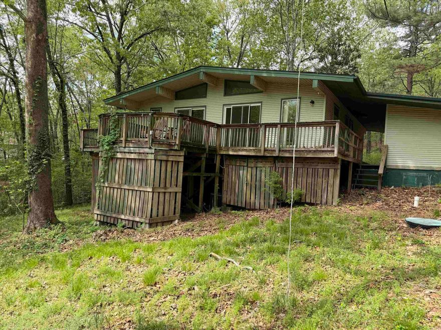 Lake Home on 2.36 AC M/L! Check out this home with a view of the lake off of the back deck. You will love this one, located in the town of Cherokee Village. Buyer to verify all information about property, call today to schedule a look.
