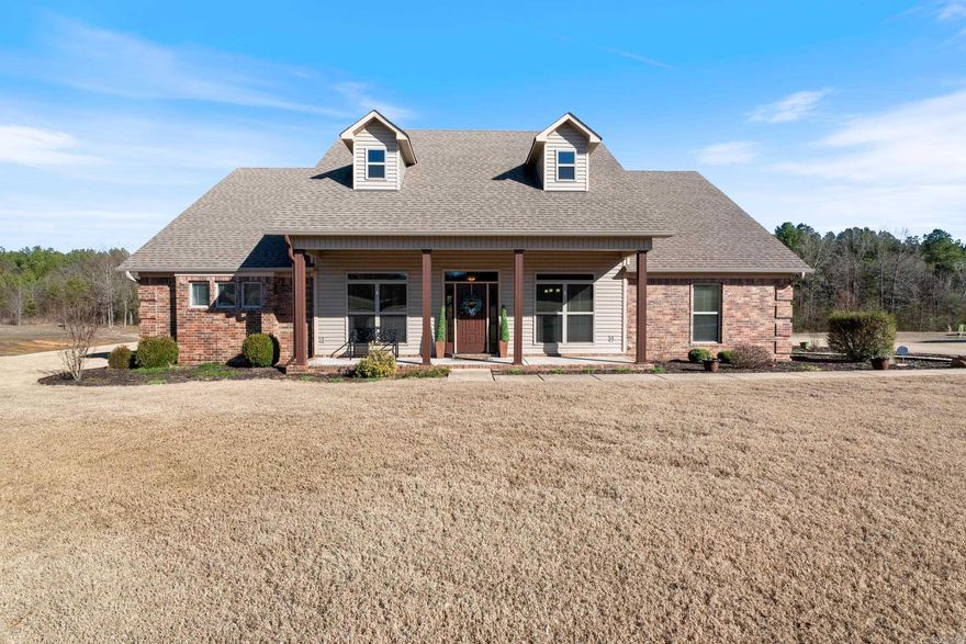 Custom built home on 1.43 acres! Located in Greenbrier’s desirable Porter Field Estates, situated in a quiet cul-de-sac backing up to a serene wooded area, this immaculate home with a thoughtful split floor plan showcases beautiful wood floors, crown molding and tons of natural light offering both comfort and functionality. This beautiful home has so much to offer including 2,483 sqft of spacious living, 3 beds, office, 2 full & 2 half baths. The gourmet kitchen features granite counters, gas range, lots of cabinets and counter space, walk-in pantry & 2 dining areas. Enjoy the inviting covered patio overlooking the huge backyard with garden area and above- ground swimming pool & deck with a backdrop of wooded views. The 3 car garage is a haven for hobbyists, boasting a shop area, walk-up storage with a floored attic, and the addition of a half bath. Don’t miss the opportunity to make this house your home within the top-rated Greenbrier School District! Schedule a tour today. Professional photos coming soon! Agents see remarks.