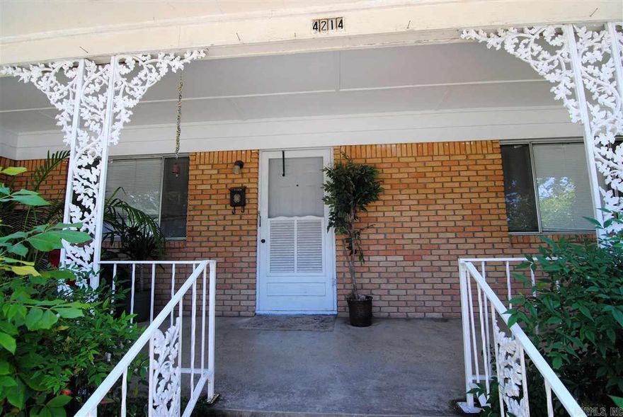 Beautifully restored Hardwoods throughout this 2 Bedroom/1 Bath Unit in Park Hill neighborhood.  Covered Parking and Storage Unit plus Front Porch and Large Side Yard.