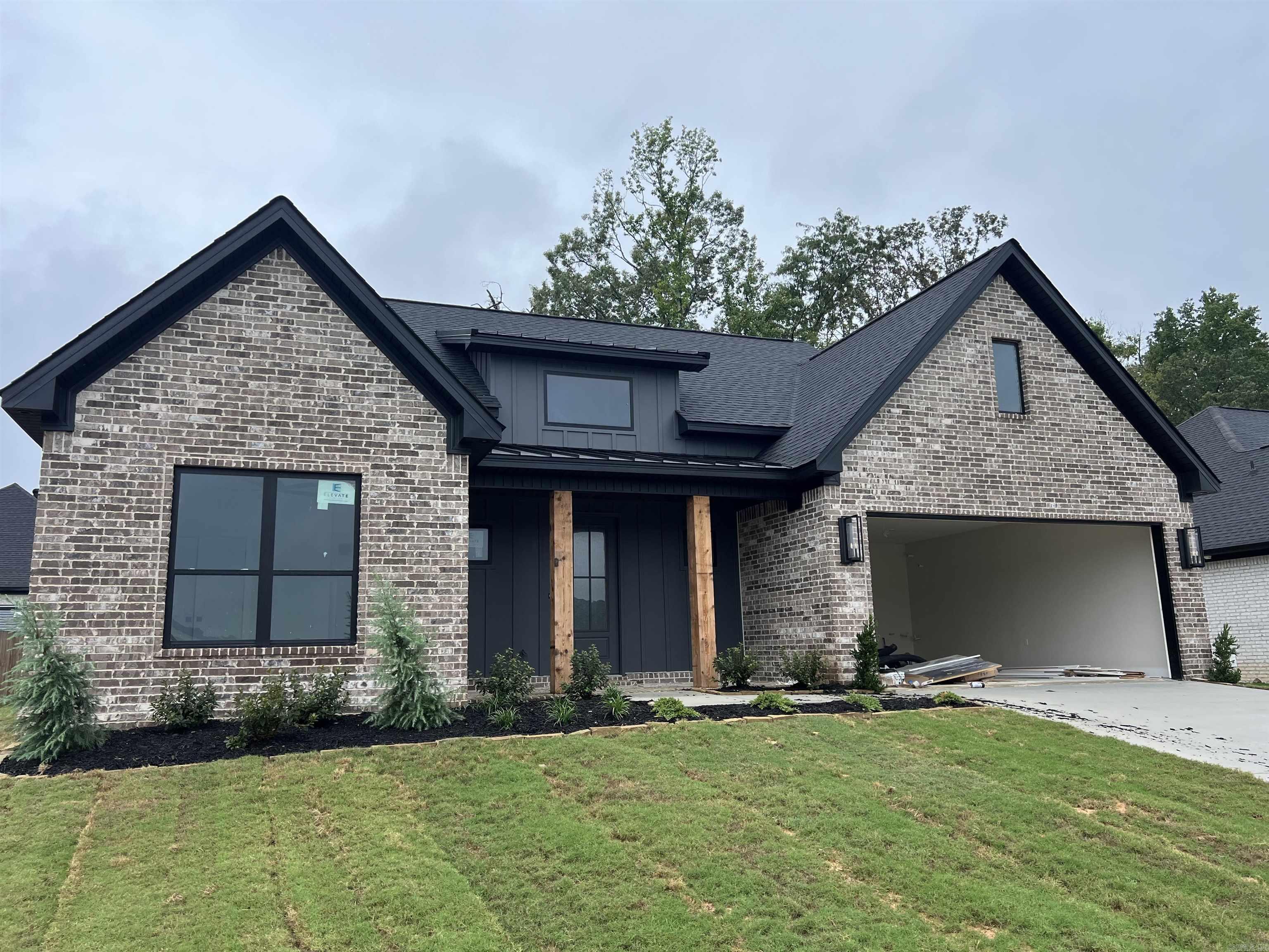 In one of the newest subdivision in Saline County is this nice quaint home in Coral Ridge Estates. This home has many many extras, such as an outdoor kitchen, upgraded lighting, no carpet, 12' ceilings tongue and groove ceilings, lots of extras you must see!