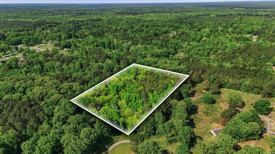 The one thing they aren't making anymore of, is land! This 5 acre tract of land is looking for new ownership. On the outskirts of town is this piece of land that has beautiful trees surrounding it and nothing but space and opportunities to make dreams a reality. For those of you in the market for a raw plot of land to build on, use as a little get away from the city and fast pace life. This property offers all of those possibilities for that special person or family looking to call this place home.