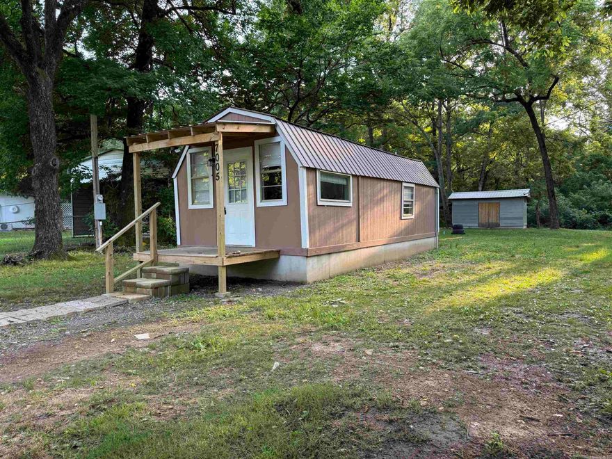 Jessieville School District!  Cute 1 room tiny furnished house with full kitchen and full bath on a nice grassy 1/2 acre of land. Own & Live affordably! Or Buy to Rent out!