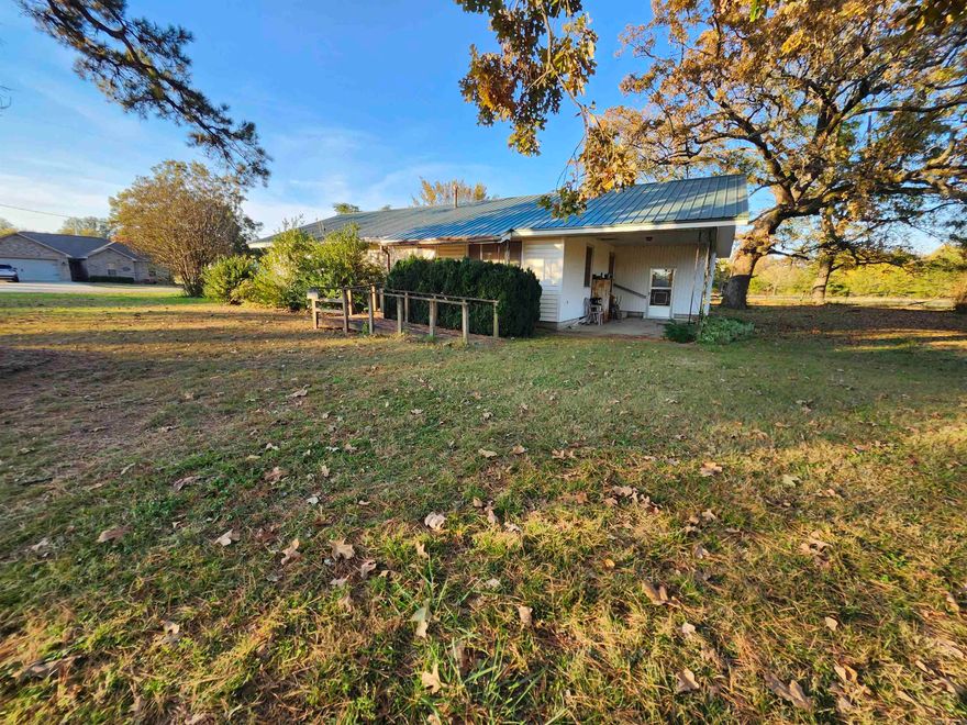 Havana home with 1,296 square feet and 3 bedrooms and 1 bath. The property sits on 2.43 acres with a barn/storage building and the pasture next to the house has a small pond.