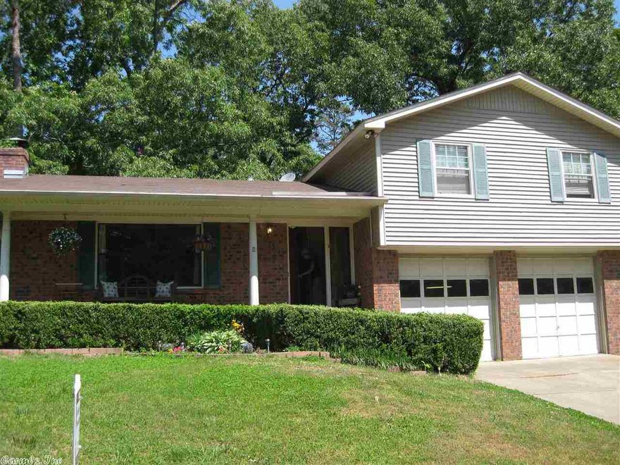 Living room has huge picture window with lots of natural light, fireplace and built-ins! Open Kitchen/Dining area. Fresh Paint thru-out! Master bedroom has large master bath with two closets.  Separate laundry room with lots of counter space and cabinets, room for deep freeze. Fully fenced yard. Refrigerator, washer, and dryer can convey with acceptable offer. Great family home close to park and pool!