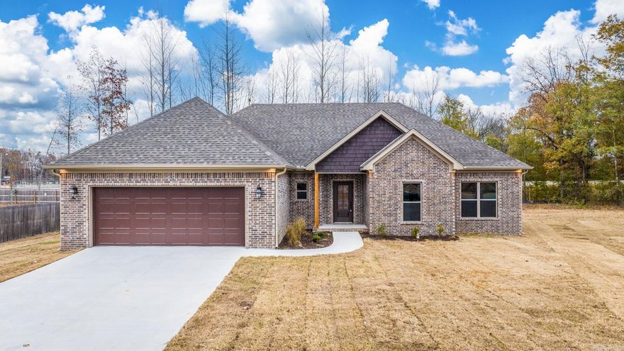 Beautiful new construction home in Hidden Valley Estates! Hardwood look tile throughout, granite/quartz countertops, custom cabinets, vaulted ceiling, custom trim and stain, custom tiled shower, large hidden pantry, his and her closets AND vanities in master, large covered back porch and tons more.