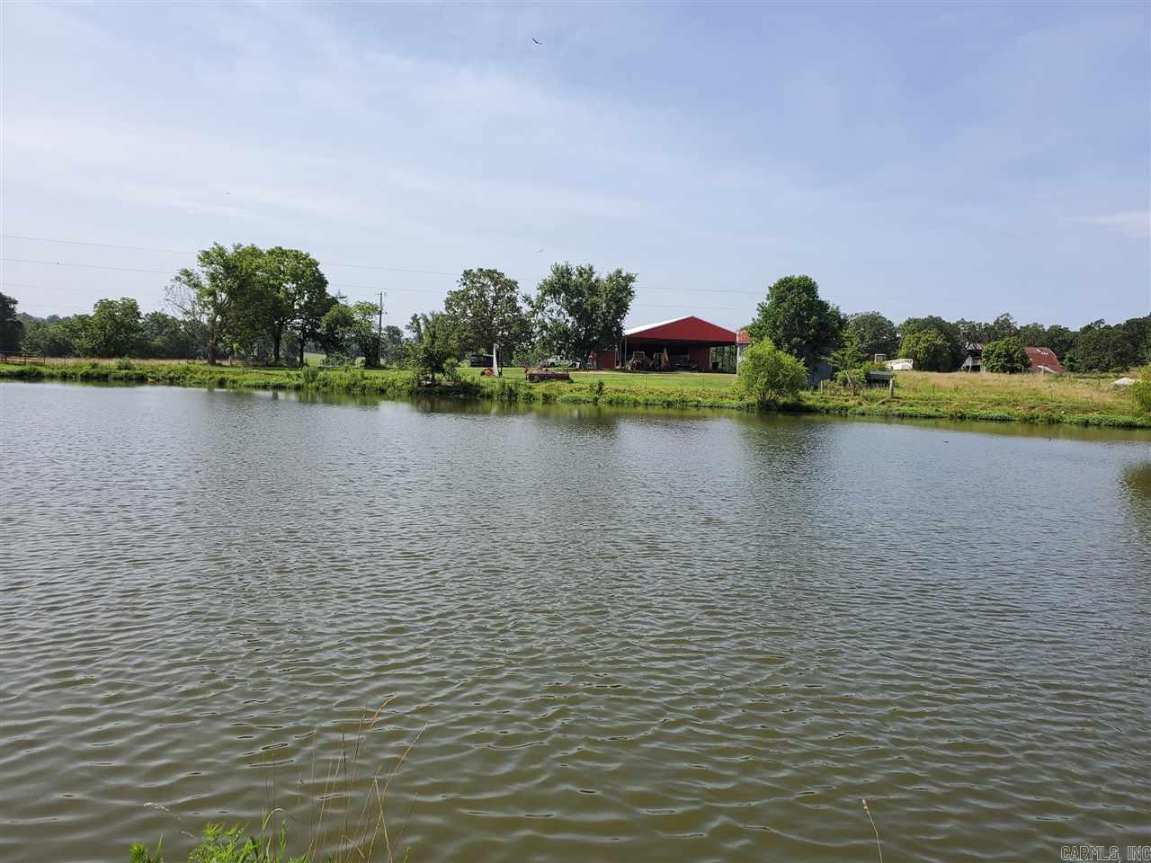 Beautiful 926+/- acre ranch along banks of the Strawberry River near Wiseman, AR. 500+/- acres of pasture and bottomland and 400+/- acres of timber, this stunning property offers plenty of room for cattle ranching, farming, and timber harvest. This property has a home built in 2010 with 3 beds, 2 baths, as well as a hunting cabin. Abundant wildlife for hunting, and the beautiful river for fishing! Property has several barns and a solar-powered deep well for watering livestock. This property is a wonder!