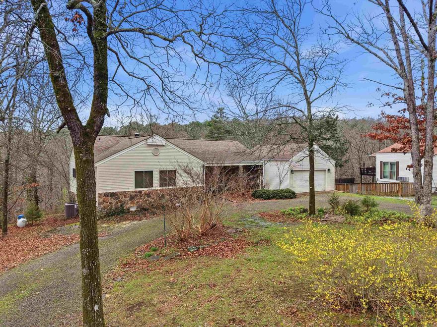 Discover comfort, style, & peaceful surroundings in this beautifully updated home located across Indian Hills Golf Course. Thoughtfully refreshed with new paint, new appliances, quartz countertops, & luxury vinyl flooring, this home blends modern updates with warm, inviting charm. The open kitchen & living area create the perfect gathering space, highlighted by a stunning stone fireplace & natural light that flows throughout the home. Beautifully updated bathrooms add a fresh, modern feel while maintaining comfort & functionality. Step outside onto the spacious covered back porch, an ideal place to relax with morning coffee or unwind in the evening while listening to the tranquil creek flowing. The lower level offers incredible flexibility, making it perfect for guests, children, or a private retreat for family & friends. Perfectly situated just minutes from Circle Acres Boat Launch, this home offers easy access to lake days, outdoor adventures, & the relaxed lifestyle that makes this area so special. This is more than a home — it’s a place to slow down, gather, & enjoy everything the surrounding area has to offer. 2005 Sylvan boat for sale with slip conveying at FFB Marina $13,900