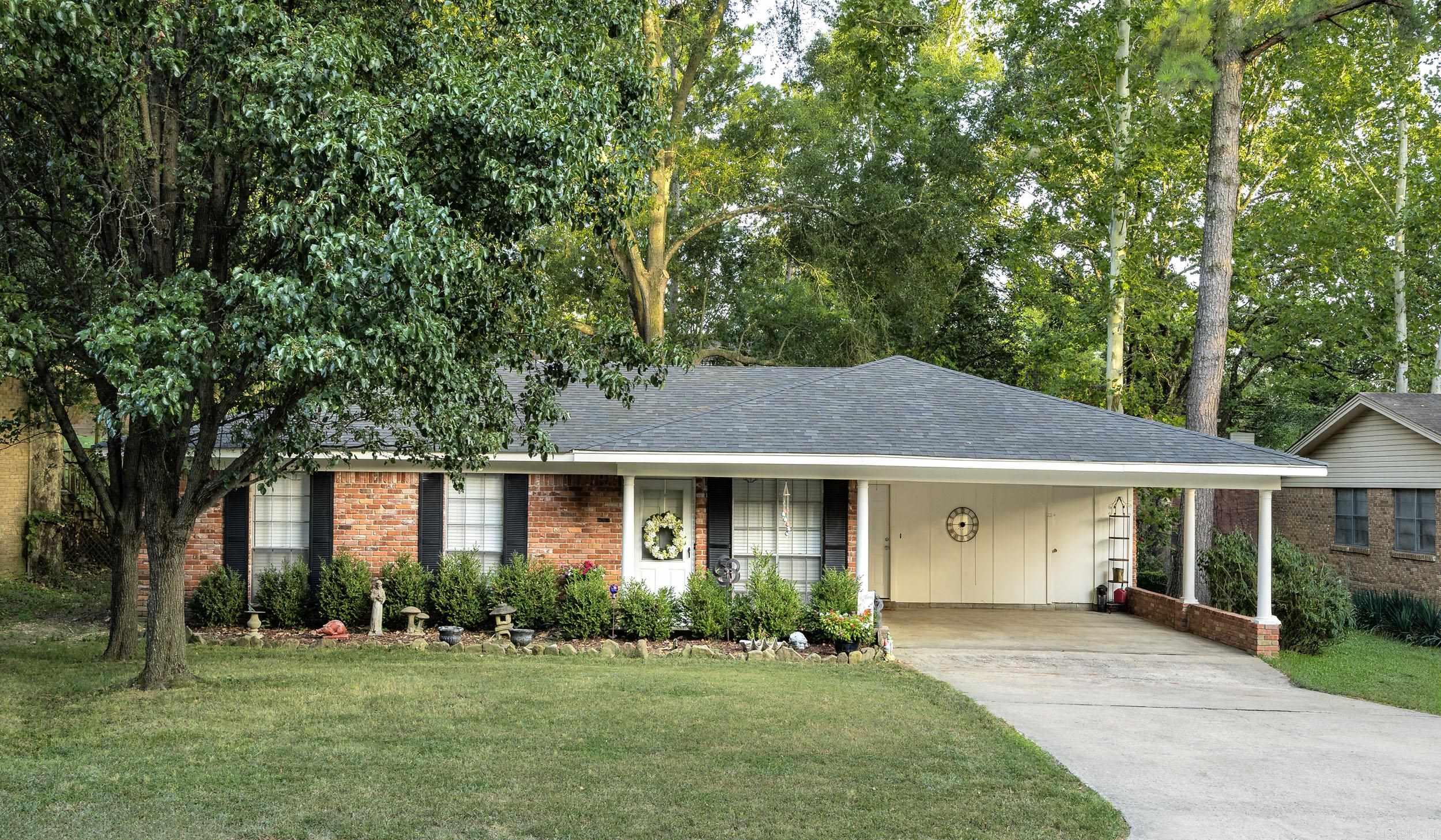 SOOOO CUTE! This one level three bedroom two bath home is ready to go! Two car carport, updated kitchen, fenced backyard, out side storage shed on a slab and so much more make tis home ideal for first time buyer or anyone looking to downsize to this conveniently located neighborhood in the heart of Little Rock! Agents see remarks