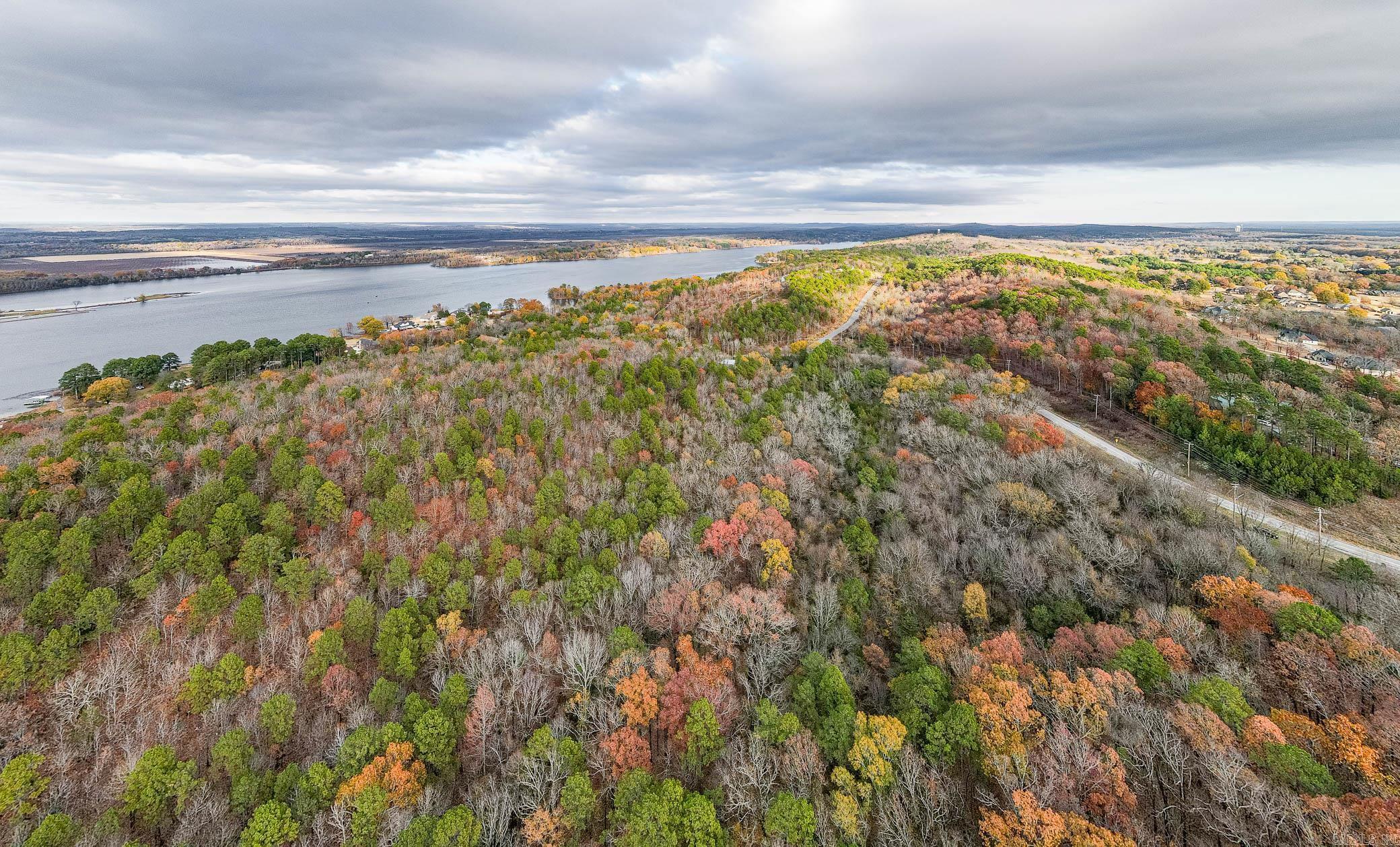 Come see this 10.39 Acres that overlooks lake beaver fork in Conway. Property is not located within the city limits. No restrictions on the property.