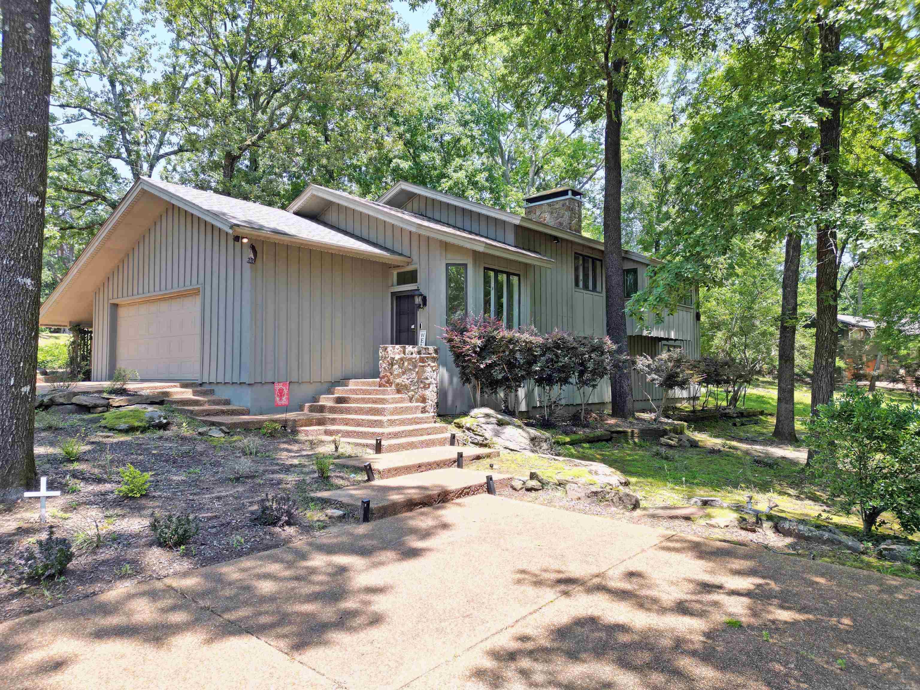 Remodeled Eden Isle home on the 15th green of the world class Red Apple golf course. Beautifully updated including new bathrooms, kitchen, fixtures, floors, new Pella doors and windows. Perfect home for entertaining inside or out! Outdoor kitchen under the covered back deck with top of the line stainless steel Bull brand grill, sink, and cabinets. Relaxing water feature just behind the back deck. Just a short golf cart ride to Eden Isle Marina or the other community amenities that include swimming pools, Red Apple Inn restaurant, and fitness center.