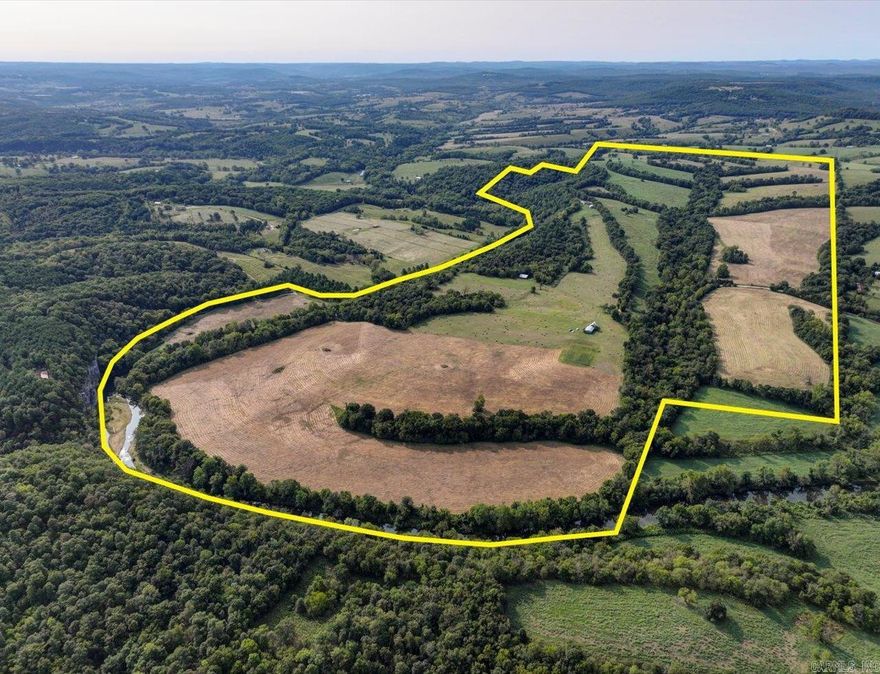 Kings River – Madison 1500 spans an impressive 380 acres and boasts 8,100 feet of Kings River frontage. This tract of land, primarily farmland, offers a unique combination of agricultural value and natural beauty, with a county road conveniently dividing the property for easy access.  The house sits on a 6.28 acre parcel and neighbors the larger Kings River – Madison 1500 Property, offering a prime location with access to Kings River and the surrounding farmland.