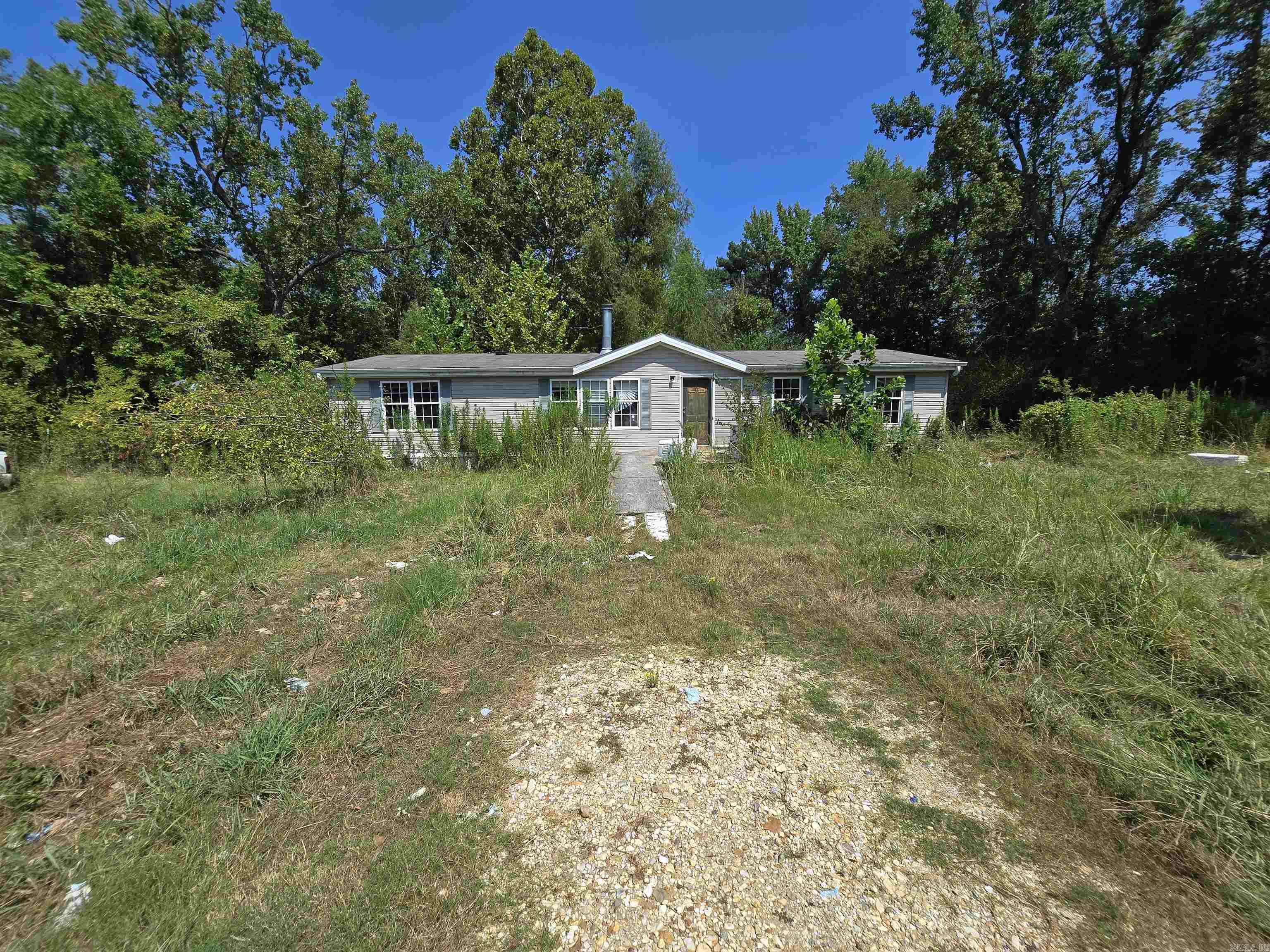 Come check out this 4 bedroom 2 bath home waiting for you to make it your own. It does need some repairs to make it your own. Great piece of level land that is fully fenced.
