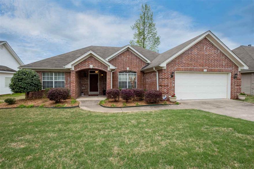 Welcome Home! Lovely house in Fairway Woods Subdivision boasts large, bright rooms, amazing living area w vaulted ceilings & formal dining room. Wonderful one level, 3 bedroom, 2 bath split floor plan with eat-in kitchen plus breakfast bar & hearth room (double sided fireplace), tile counters & backsplash, SS appliances. Refrigerator, washer & dryer all convey. Master suite features oversized walk-in closet, a jetted tub and a walk-in shower. Loads of crown molding, private fenced back yard and rear patio.