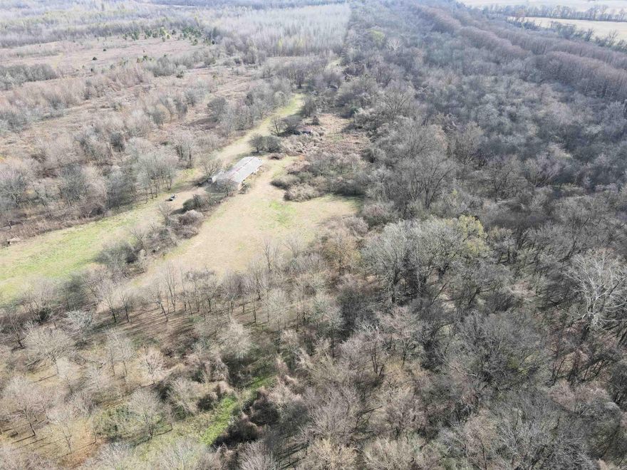 - 280 +/- acres  - 270 +/- acres in perpetual WRE program - 10 +/- unrestricted acres - Multiple barns/sheds - Mixed age hardwood timber - Nearly 1.5 miles of year-round creek - Incredible hunting - Seasonal flooded green timber opportunities - Blacktop frontage - 20 miles to Little Rock National Airport - 33 miles to Pine Bluff