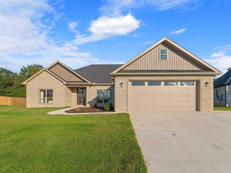 Welcome to your dream home! This brand-new construction has contemporary elegance & thoughtful design, offering the perfect blend of comfort and style. As you step inside, you're greeted by an expansive open floor plan that effortlessly combines the living and kitchen areas, creating a seamless flow for everyday living and entertaining. The heart of the home, the kitchen, features a sleek breakfast bar, large walk-in pantry, custom cabinets, stainless steel appliances, & granite countertops. Separate dining room. Oversized laundry room. The living room is the epitome of relaxation, centered around a corner gas fireplace. This home offers four spacious bedrooms, providing ample space for the whole family or guests. The master bedroom is a true retreat, boasting a luxurious ensuite bathroom complete with a soaker tub, perfect for unwinding after a long day, and a separate walk-in shower. And you will love having lake access.