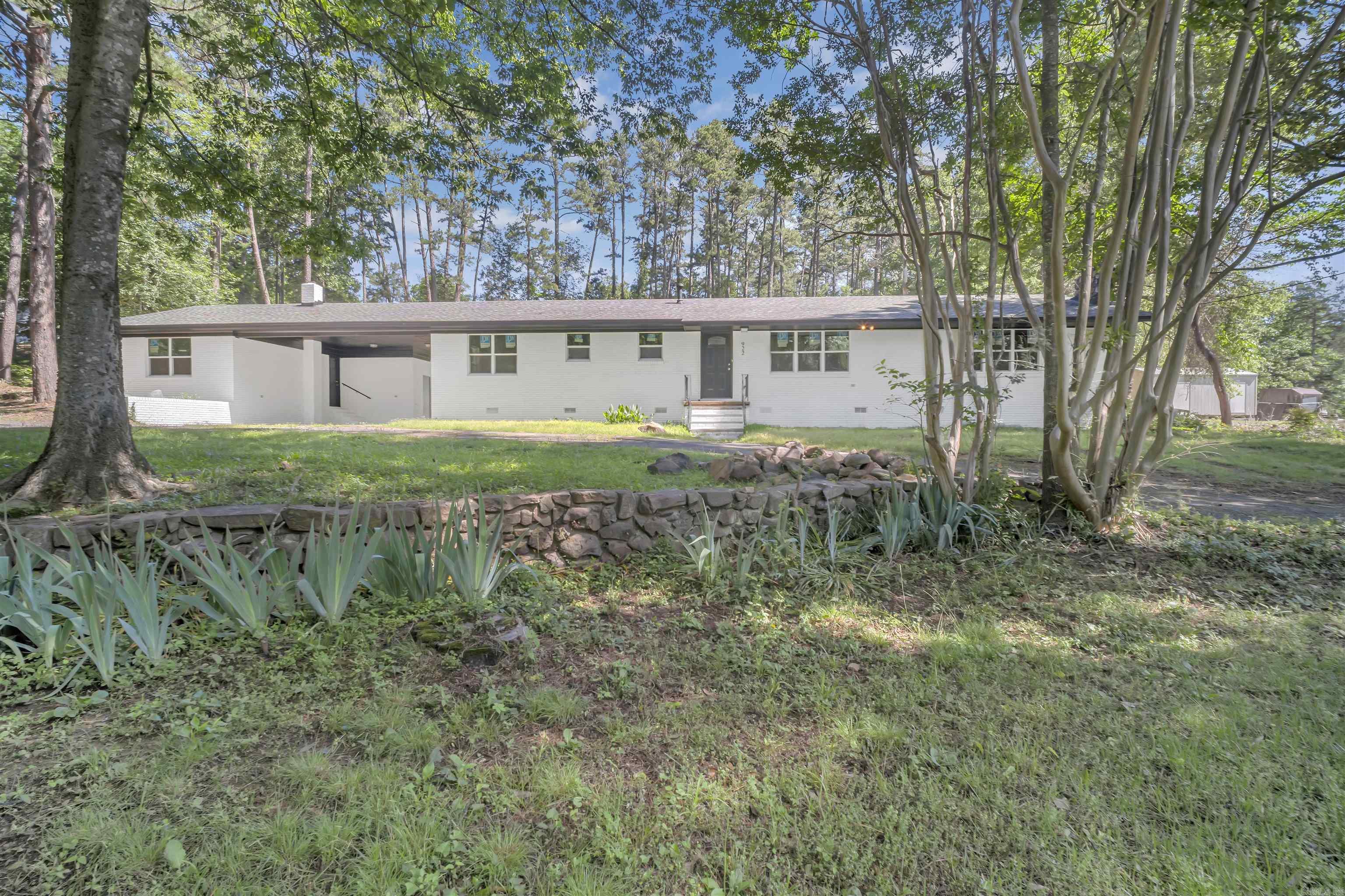 Wonderfully updated and remodeled home, new roof, new floors, kitchen, and appliances. This home features a split floor plan large dining and living room with a cozy fireplace. Large separate room off the carport for a craft room, home office or play room. Large storage building and circle drive. Great location and walking distance to the elementary school. 45 minutes from Little Rock, 30 minutes from Conway and 20 minutes form Morrilton. Large dogwood trees and crepe myrtle trees and blooming flowers. Don't miss this once a generation listing for this particular area of Perryville. Please no trespassing, real estate agent must be present.