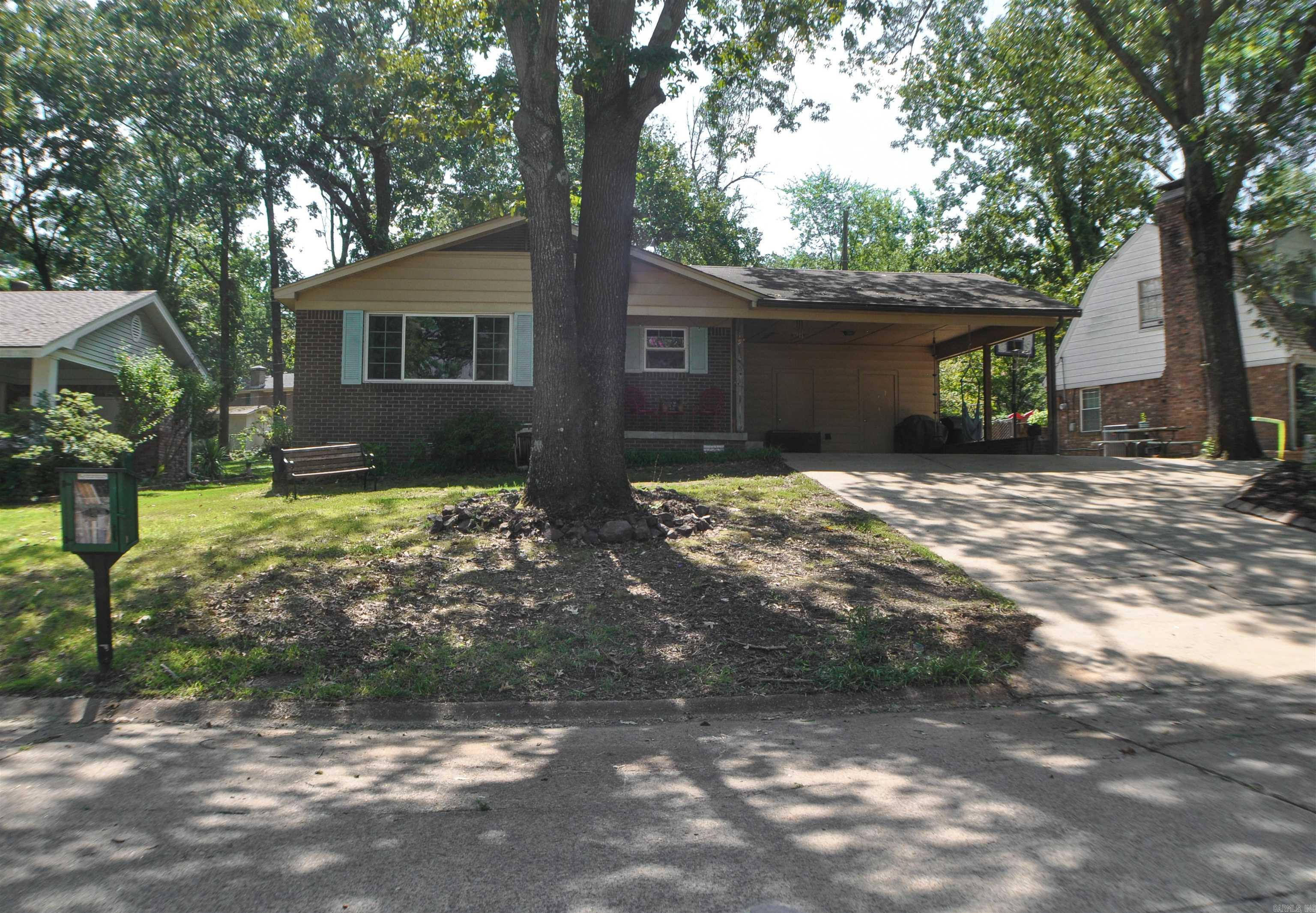 Come sit on your front porch and enjoy wonderful neighbors in one of the MOST desirable mid-town neighborhoods: Briarwood! Located in the heart of Little Rock with easy access to fine dining, medical facilities, shopping, entertainment, and more! This 3bd/2ba home features a large family room perfect for hosting friends/family! You’ll love the fully fenced, spacious back yard and the extra parking alongside the double carport. Updates include a laundry room, tankless hot water heater, new picture window in front room, new shower in primary bedroom and more! What a find! Hurry!