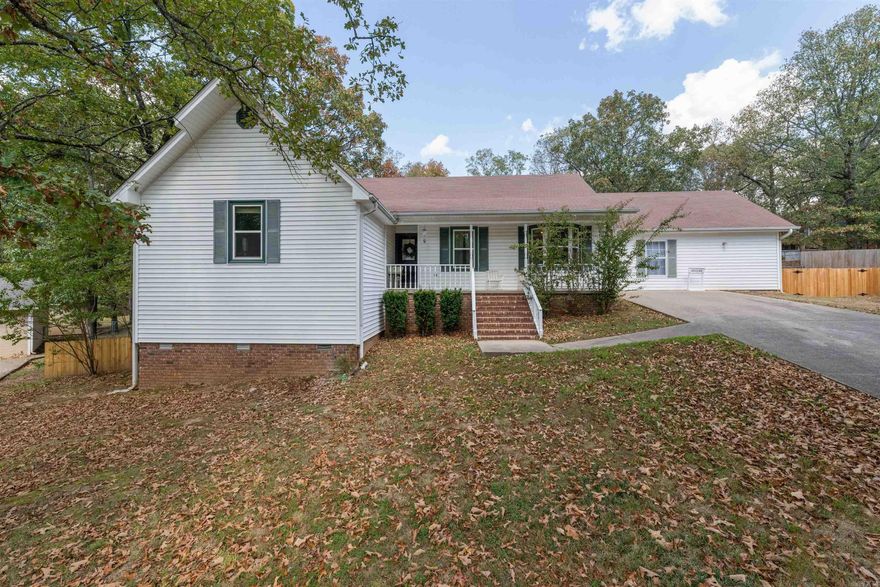 This home is the perfect combo of city and country living. On an acre of land you will have privacy and room to move, but are minutes away from anything you need. The garage has been recently enclosed to create 2 more bedrooms and a full bath. This works for a large family, guests, in-laws or just extra office and craft room space. This home is all one level. The back doors open into a deck that overlook a spacious yard.