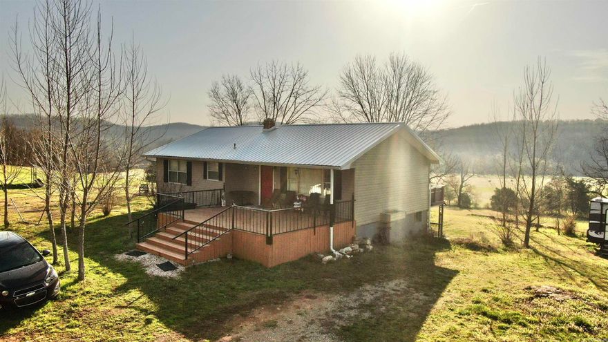 Nestled in the quiet countryside of Sharp County, this gorgeous property on Baker Cemetery Road offers the perfect blend of privacy and functionality on just under 23 beautiful acres near Martin Creek. The completely remodeled home features a spacious layout with a walkout basement, providing extra living space, storage, or potential for a separate living area. Outside, the land is ideal for outdoor enthusiasts, hobby farmers, or anyone seeking room to roam. A large shop offers ample space for equipment, projects, or a home-based business, while the barn/stable is ready for livestock or horses. Enjoy peaceful surroundings, scenic views, and endless possibilities—all within a short drive of town. Whether you're looking for a homestead, recreational retreat, or investment opportunity, this property delivers space, versatility, and rural charm!