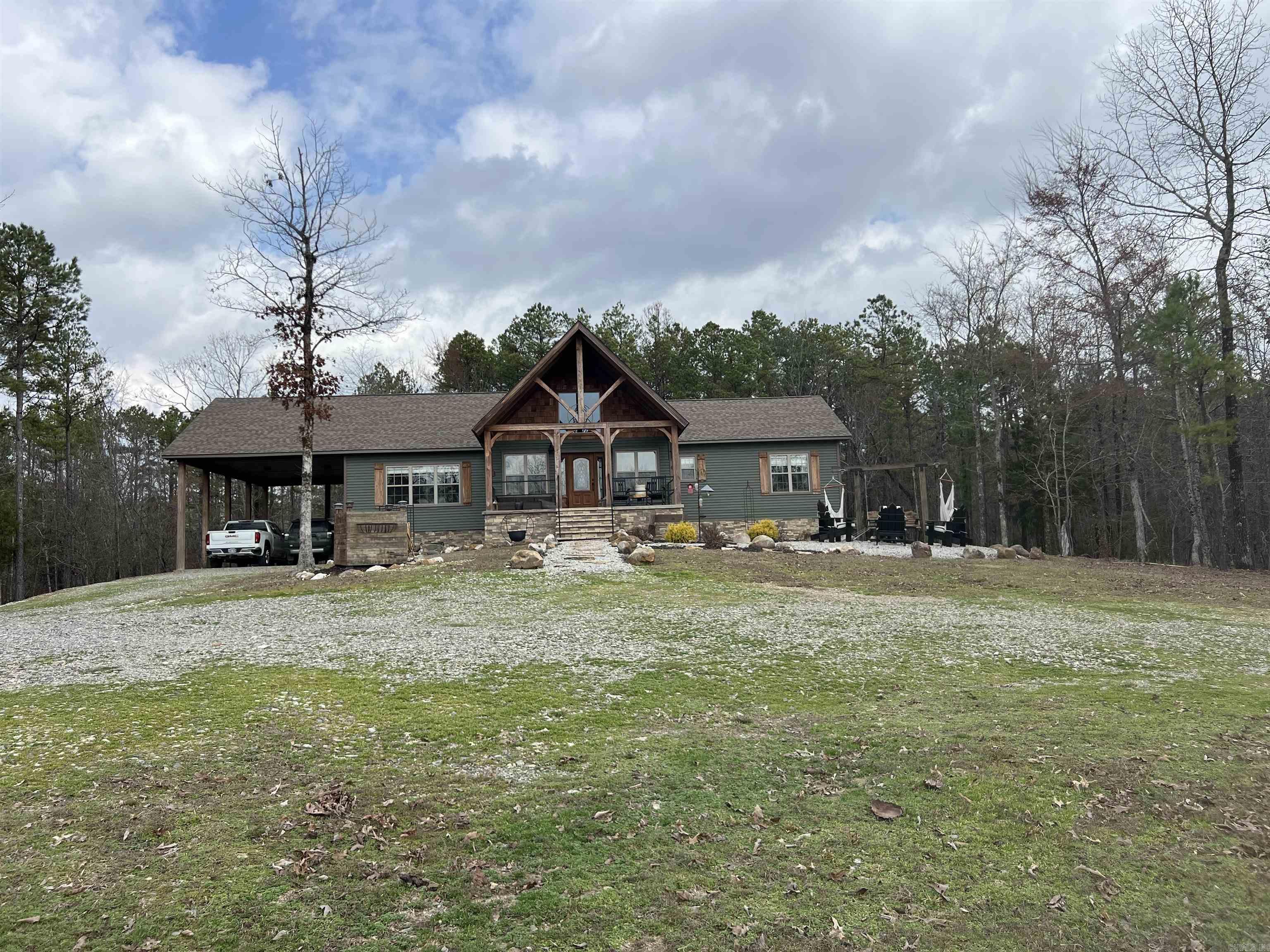 Custom-Built Showstopper on 6.23 Acres Near Lake Ouachita This stunning three-bedroom, two-bath home blends luxury craftsmanship with peaceful country living. Inside, soaring tongue-and-groove vaulted ceilings and a cozy gas log fireplace create a warm, inviting atmosphere. Every detail is thoughtfully finished, from the premium doors and windows to the custom-built countertops. The spa-inspired primary suite features an enormous walk-in shower and a giant walk-in closet, while the kitchen boasts a large walk-in pantry designed for serious storage. Outdoors, youāll find a whole house generator that will provide comfort and convenience with a power outage, a 31x40 shop with two roll-up doors and a 20x40 lean-to ā perfect for projects, equipment, or toys. The 6.23-acre property is alive with wildlife and offers breathtaking, serene views, just minutes from beautiful Lake Ouachita. This home isnāt just a place to live, itās a retreat youāll never want to leave.