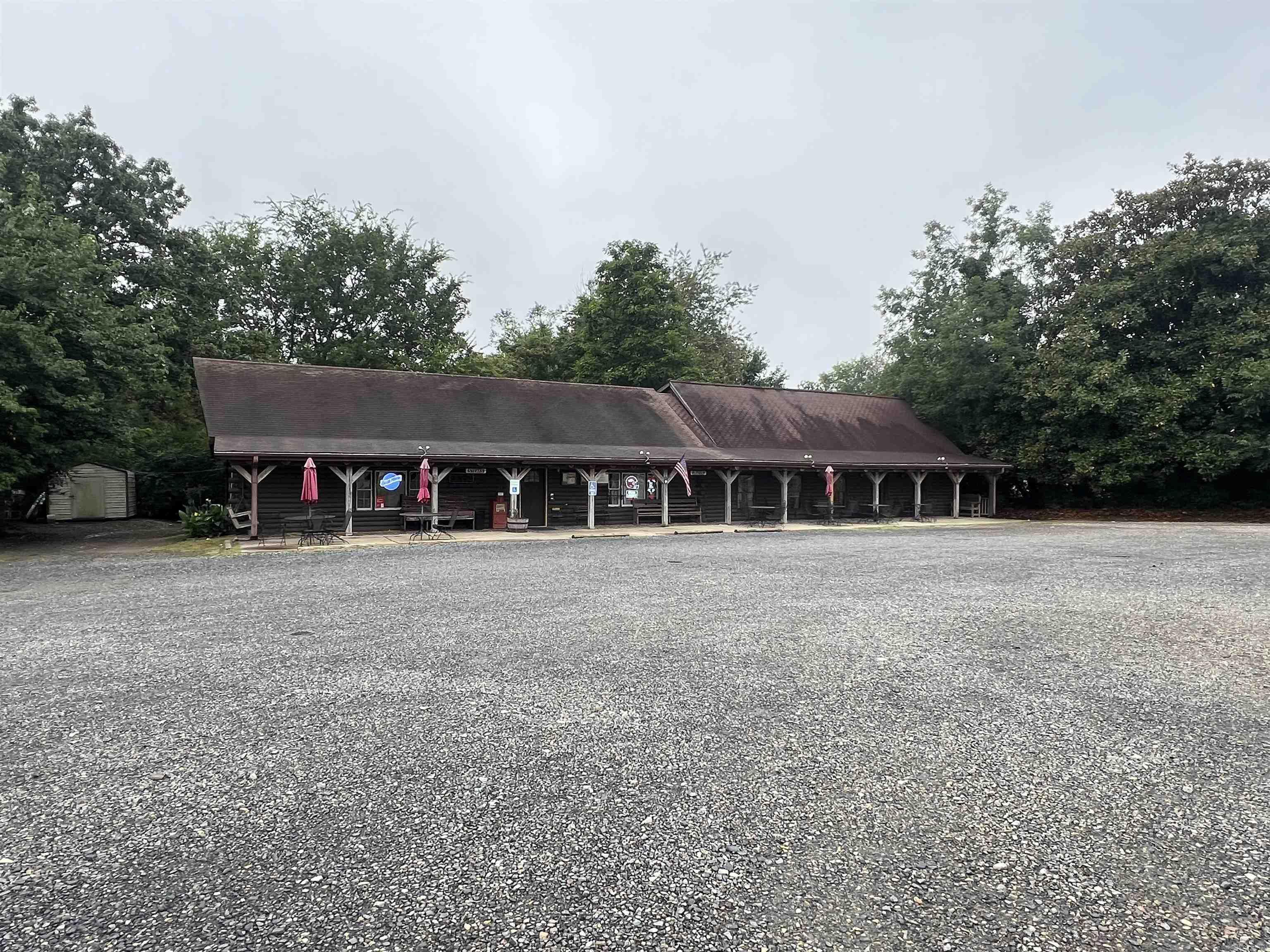 Restaurant for sale! Once in a lifetime opportunity to own one of the most successful restaurants in Polk County!! The Chopping Block Steakhouse has a 50-year reputation as one of Mena's best places to eat. Walk right into this turn-key business. Widely varied menu, meat market, full bar setup. All food, liquor, equipment and furniture stays. Separate office space, and 2 other outbuildings. Definite cash flow! Fully staffed. 2 large walk in freezers. NEW 5 ton HVAC unit in kitchen, 2.5 ton unit under stairs, 2.5 ton unit upstairs, compressor freezer, slicer, fryer, potato bin, shelving in shed/bar, A/C in bar, 2 scales, water heater, front door, back door, porch posts - all new! The full back wall, bathroom siding, and building trim have all been replaced. Setup for DoorDash. Automated POS system and TOAST takes care of all the financials and DAVO tax system that provides automation for the new owner. Liquor license can be transferred to new owners. Name will also transfer to new owners, ensuring the goodwill of the business remains intact. Currently open 5 days a week, so potential for income by opening more. Possible owner financing available!