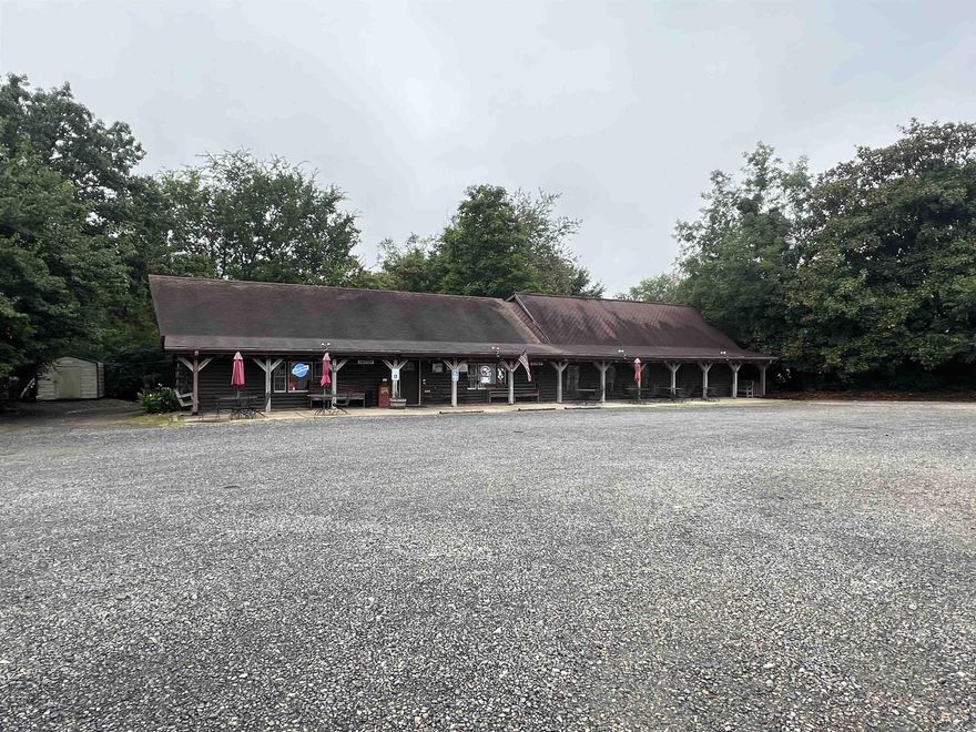 Restaurant for sale! NEW ROOFS!! Once in a lifetime opportunity to own one of the most successful restaurants in Polk County!! The Chopping Block Steakhouse has a 50-year reputation as one of Mena's best places to eat. Walk right into this turn-key business. Widely varied menu, meat market, full bar setup. All food, liquor, equipment and furniture stays. Separate office space, and 2 other outbuildings. Definite cash flow! Fully staffed. 2 large walk in freezers. NEW 5 ton HVAC unit in kitchen, 2.5 ton unit under stairs, 2.5 ton unit upstairs, compressor freezer, slicer, fryer, potato bin, shelving in shed/bar, A/C in bar, 2 scales, water heater, front door, back door, porch posts - all new! The full back wall, bathroom siding, and building trim have all been replaced. Setup for DoorDash. Automated POS system and TOAST takes care of all the financials and DAVO tax system that provides automation for the new owner. Liquor license can be transferred to new owners. Name will also transfer to new owners, ensuring the goodwill of the business remains intact. Currently open 5 days a week, so potential for income by opening more. Possible owner financing available!
