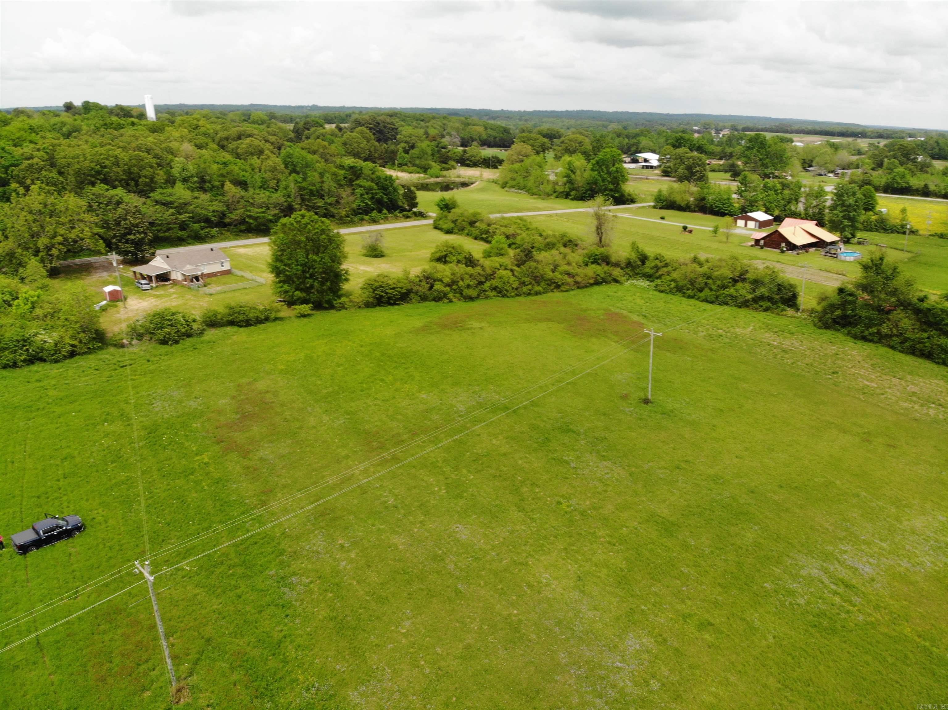 Looking for a place to build your dream house in a beautiful pasture with a small pond? ~35 Acres with great access from Sandy Ford Rd. No meters on the property, but water and electricity are at the property lines. Level and ready to build your dream house or subdivide into smaller tracts.